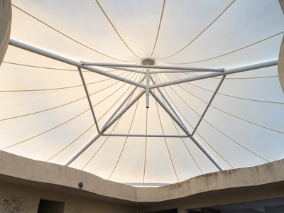 Inside view of the atrium tensile roof membrane and steel frame at KBN Hospital, Gulbarga