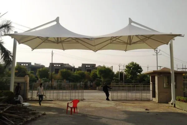 ShadeCo entrance canopy, a stylish tensile shade sail offering weather protection and modern aesthetics for home or office entryways.