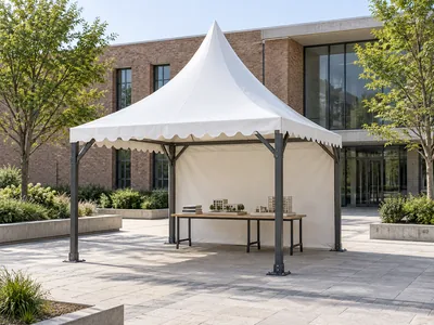 Single mild steel frame pagoda tent with an exhibition table in a university courtyard