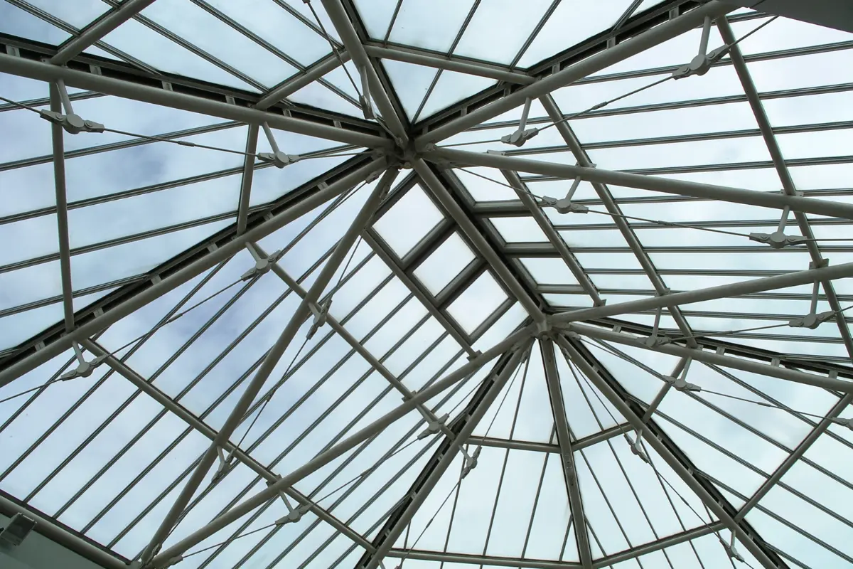 A spacious prefabricated steel structure with two doors and several windows, suitable for industrial purposes, showcasing ShadeCo's efficient prefabricated structures