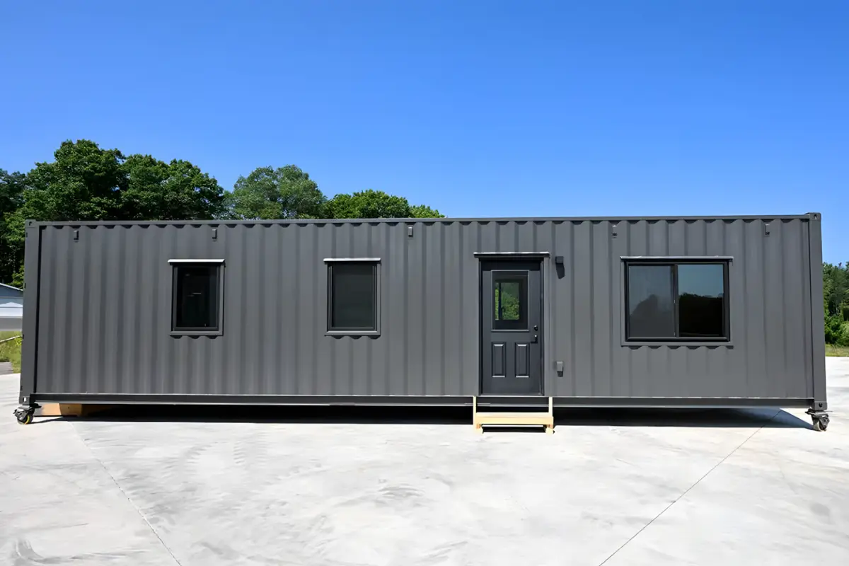 An office container home on wheels, serving as an office space, featuring contemporary design and efficient
use of space.