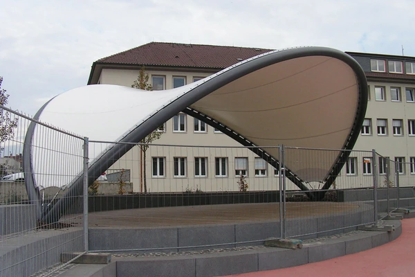 Amphitheatre tensile roof structure by ShadeCo for outdoor stage and seating coverage