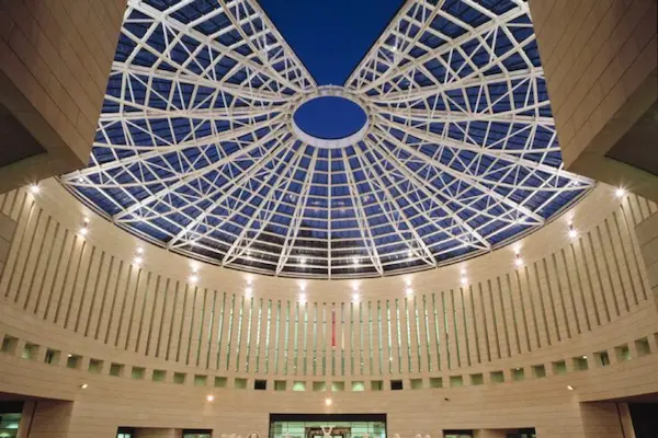 Atrium tensile roof structure by ShadeCo for modern building architecture