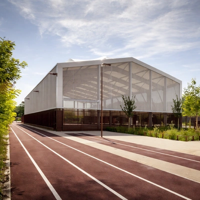 Badminton court shade structure designed for covered indoor and outdoor play areas