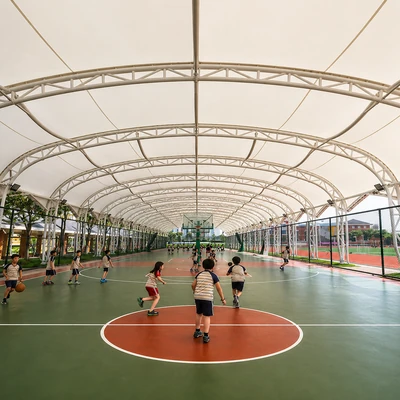 School playground shade structure providing safe shaded play environments