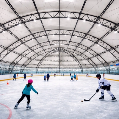 Skating rink shade structure designed for covered skating and practice areas