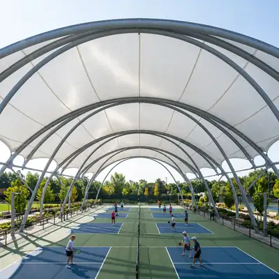 Volleyball court shade structure for shaded recreational and professional play