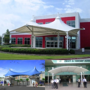 Entrance tensile canopies designed for building entry and drop-off zones