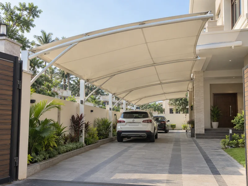 Long cantilever fabric canopy along a villa driveway from the main gate to the house porch