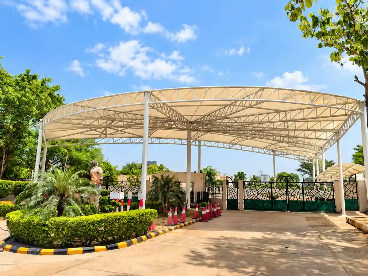 Curved PVC/PVDF fabric roof seen from inside the Heritage Public School campus, Gurugram
